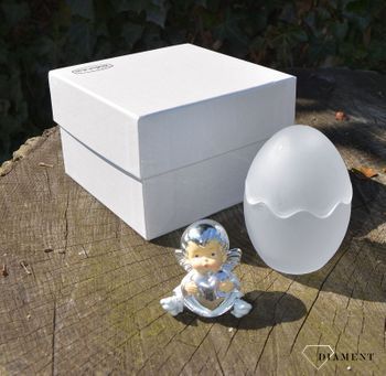 Piękna figurka aniołka trzymającego serduszko w jajku wykonanym ze szkła . Wykonana z wysokiej jakości stali oraz pokryta warstwą srebra w technologii laminowania srebrem (8).JPG